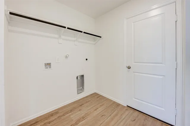 a view of small space with wooden floor