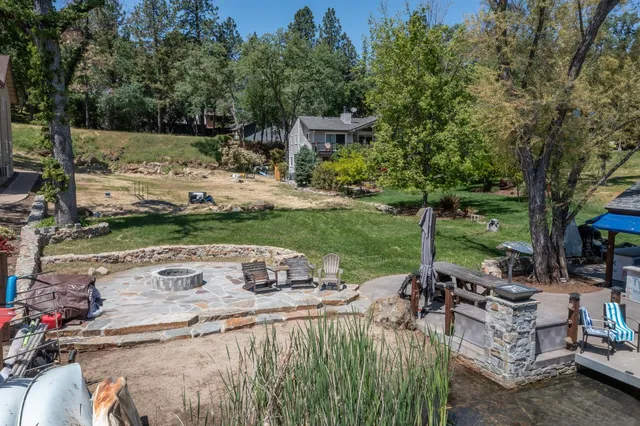 a view of backyard with green space