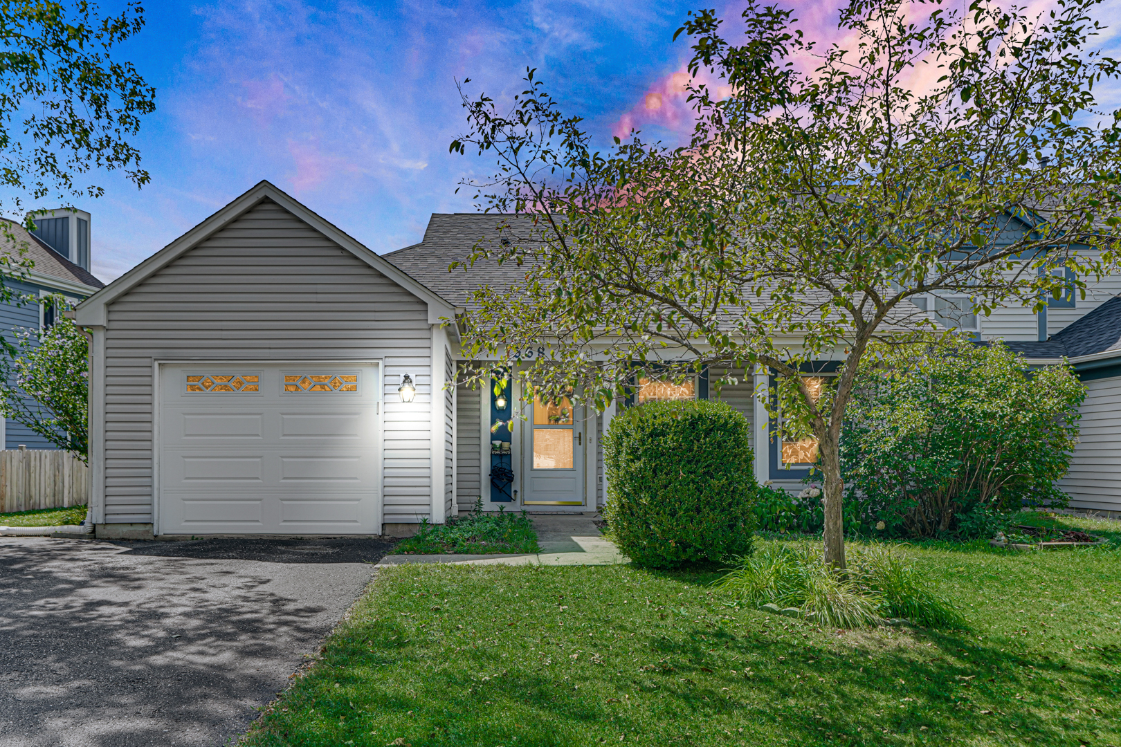 568 Colton Road Grayslake, IL 60030 - Photo 1 of 1 a view of a house with a small yard and a large tree