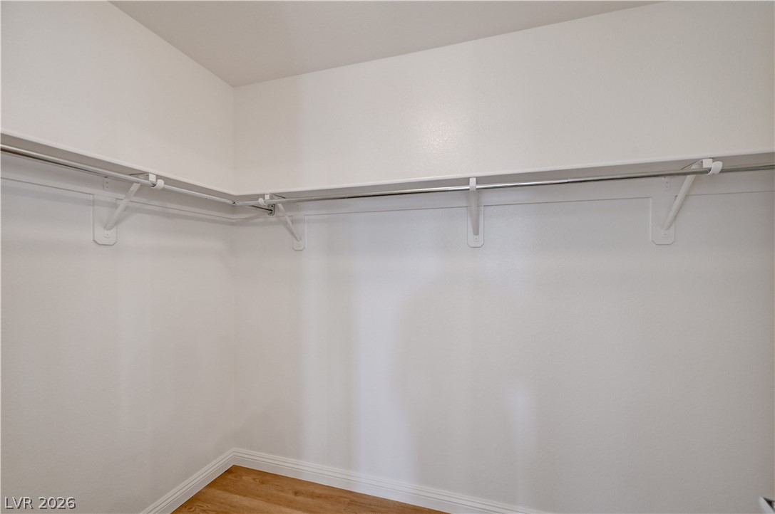 8918 Houston Ridge Avenue Las Vegas, NV 89178 - Photo 16 of 35 Customizable storage solutions define this spacious closet, perfect for personalizing to your needs.