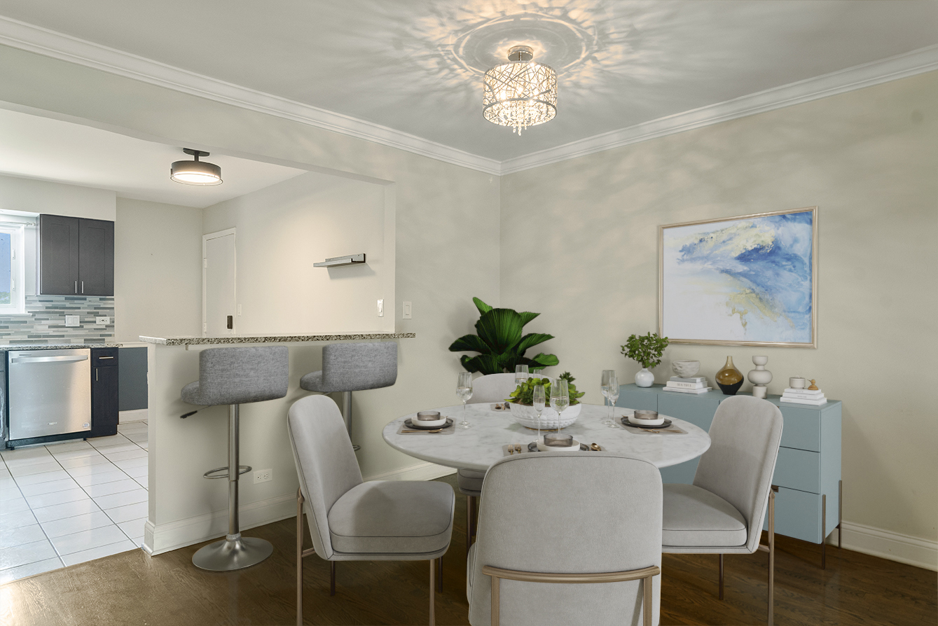 9390 Bay Colony Drive, Unit 3N Des Plaines, IL 60016 - Photo 5 of 15 a view of a dining room with furniture and wooden floor