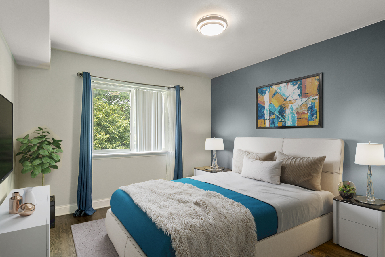 9390 Bay Colony Drive, Unit 3N Des Plaines, IL 60016 - Photo 9 of 15 a bedroom with a bed and a potted plant