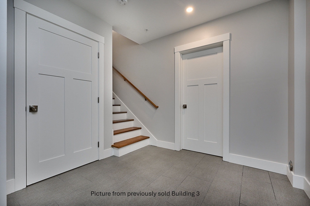 10 Hawley Street, Unit 4C Northampton, MA 01060 - Photo 18 of 23 a view of an entryway with stairs