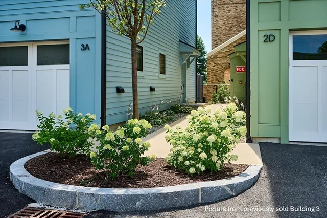a view of a bird house in a yard