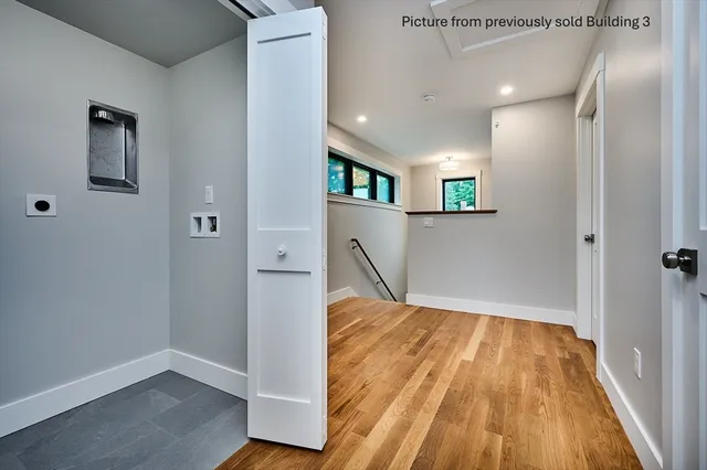 a view of livingroom with hardwood floor and a ceiling fan