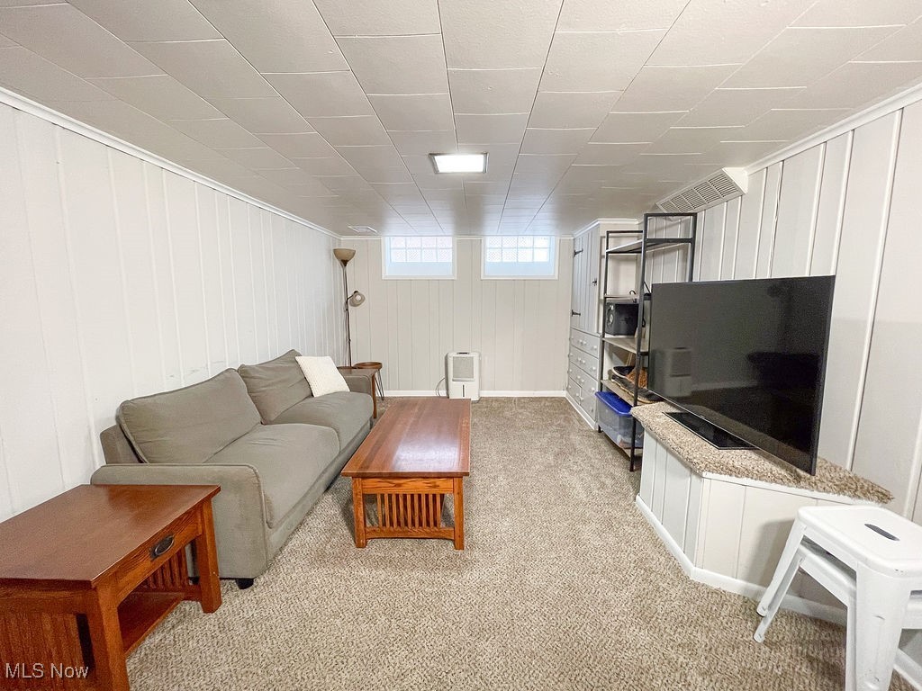2707 Hearthstone Road Cleveland, OH 44134 - Photo 40 of 49 Living room with light colored carpet and visible vents