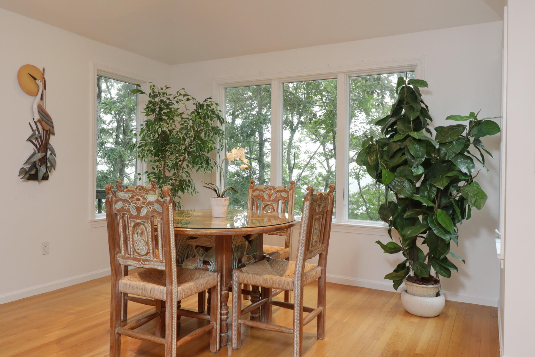 120 Fells Pond Road Mashpee, MA 02649 - Photo 11 of 42 a view of a dining room with furniture window and wooden floor
