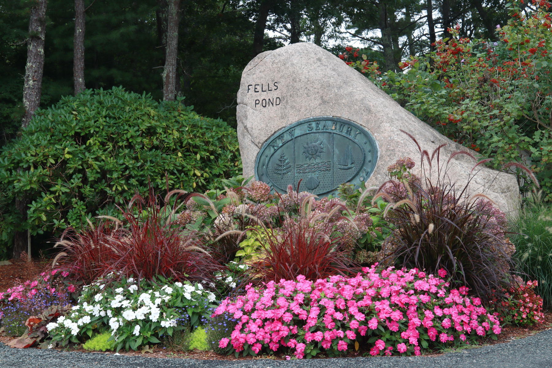 120 Fells Pond Road Mashpee, MA 02649 - Photo 2 of 42 a view of a house covered with lots of trees