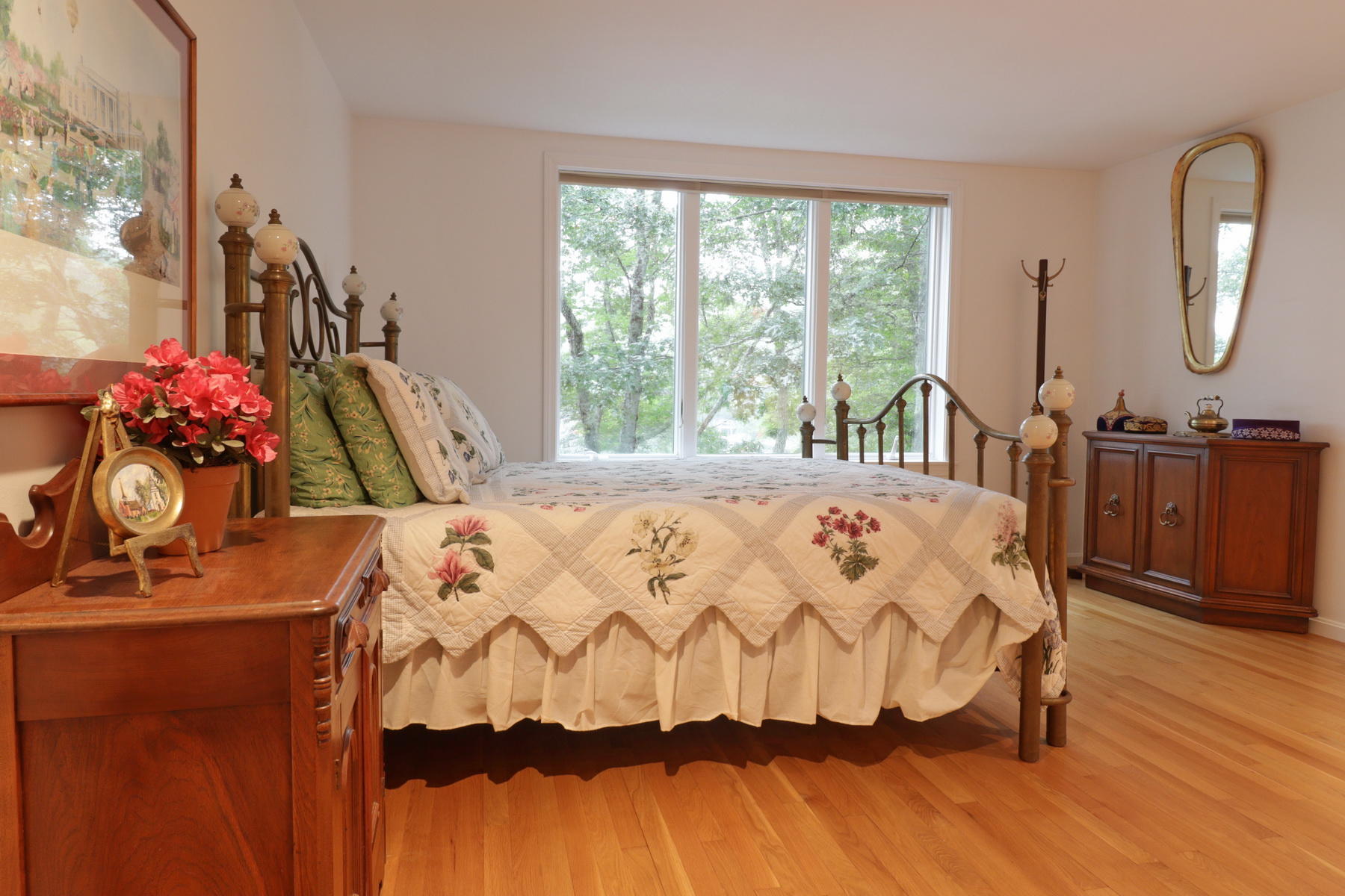 120 Fells Pond Road Mashpee, MA 02649 - Photo 27 of 42 a bed sitting in a bedroom next to a window