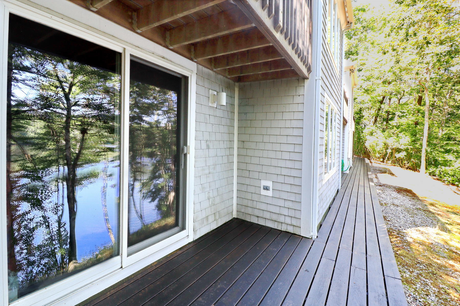 120 Fells Pond Road Mashpee, MA 02649 - Photo 31 of 42 a view of a balcony with wooden floor