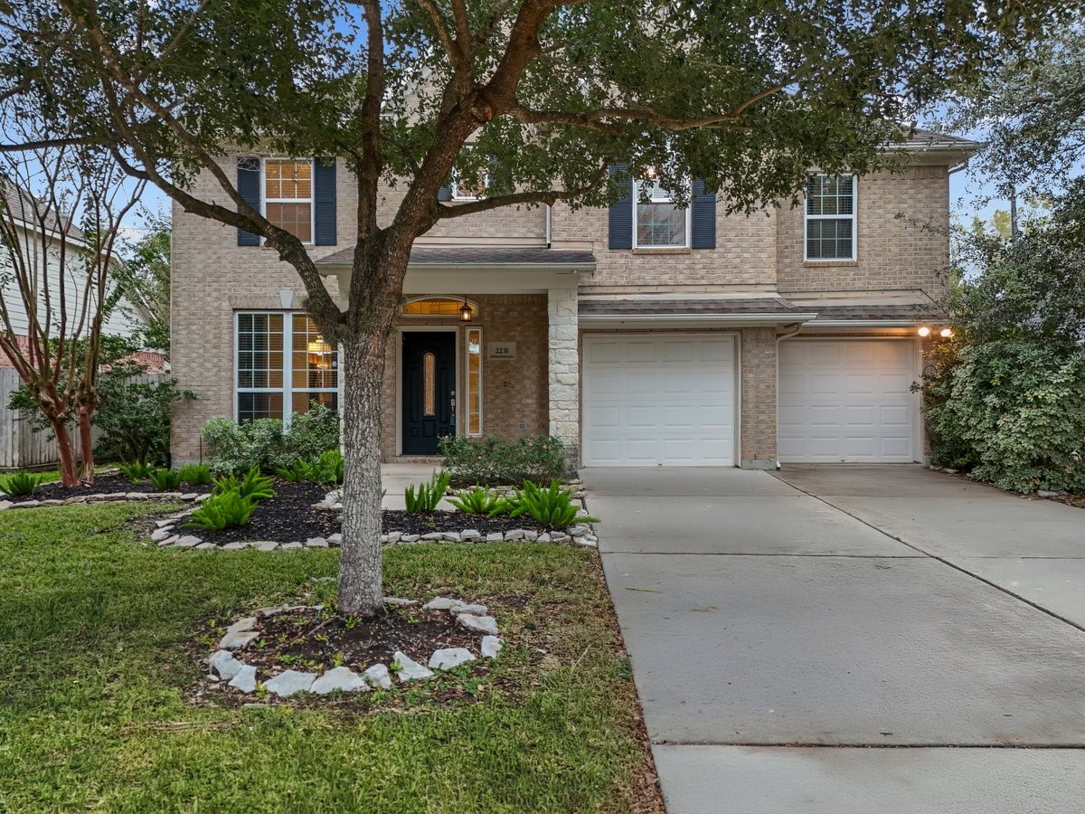 2231 Water Way Seabrook, TX 77586 - Photo 1 of 43 a front view of a house with a yard