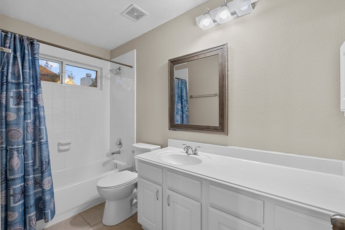 2231 Water Way Seabrook, TX 77586 - Photo 18 of 43 a bathroom with a toilet sink and mirror