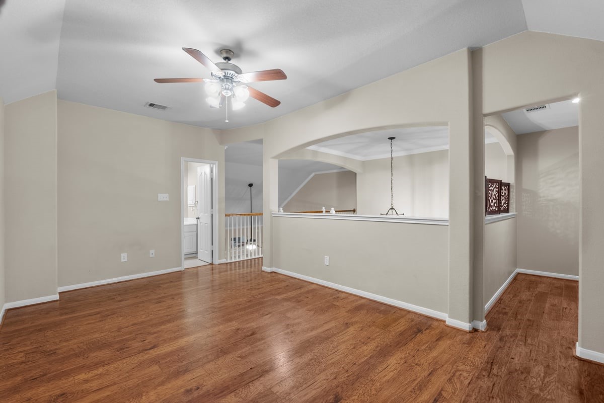 2231 Water Way Seabrook, TX 77586 - Photo 20 of 43 a view of an empty room with window and wooden floor