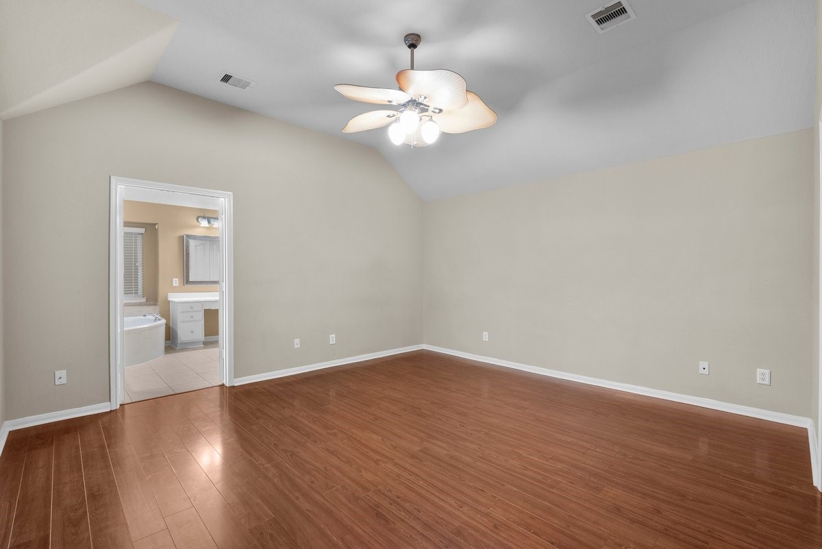2231 Water Way Seabrook, TX 77586 - Photo 29 of 43 a view of an empty room with wooden floor