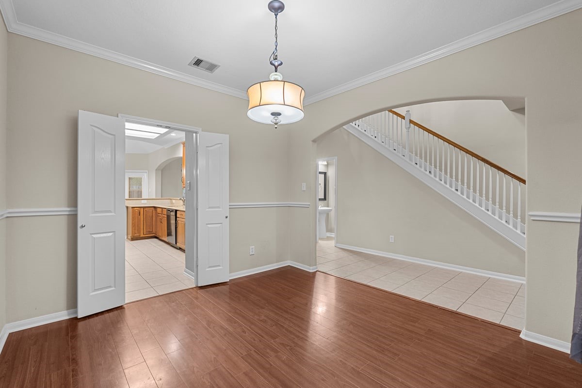 2231 Water Way Seabrook, TX 77586 - Photo 5 of 43 a view of an empty room with wooden floor