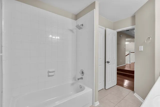 a kitchen with a stove and a window