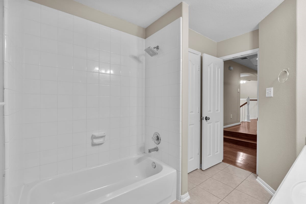 2231 Water Way Seabrook, TX 77586 - Photo 10 of 43 a bathroom with a bathtub and a shower