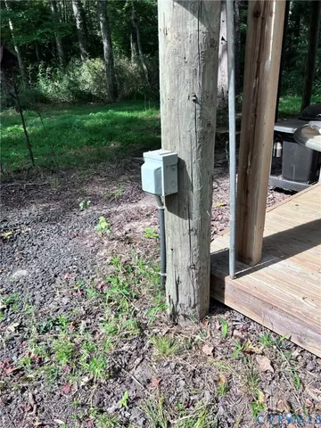 a view of a yard with a tree