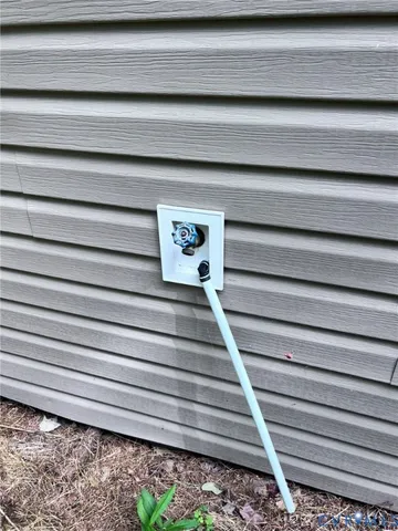 a view of a house with backyard from a garden
