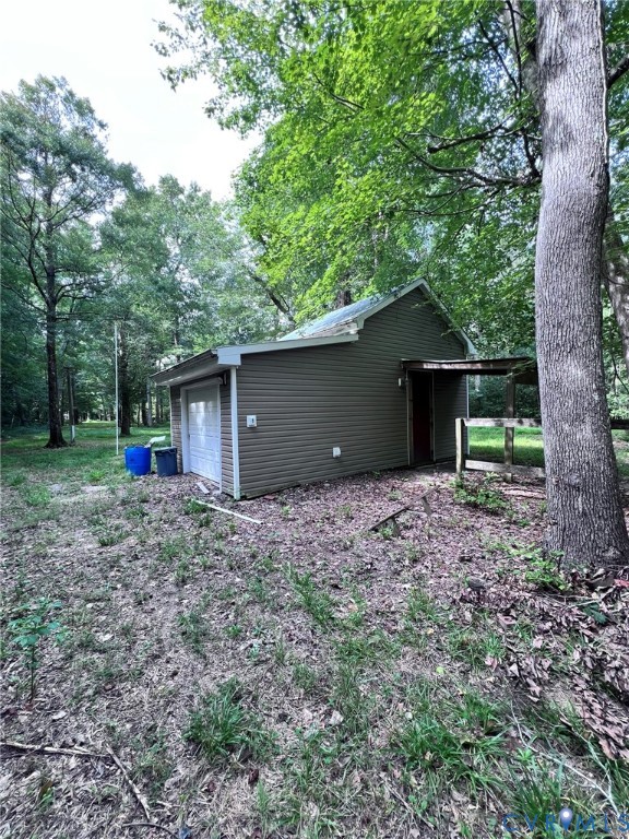 1832 Munden Point Road Virginia Beach, VA 23457 - Photo 7 of 16 a backyard of a house with lots of green space