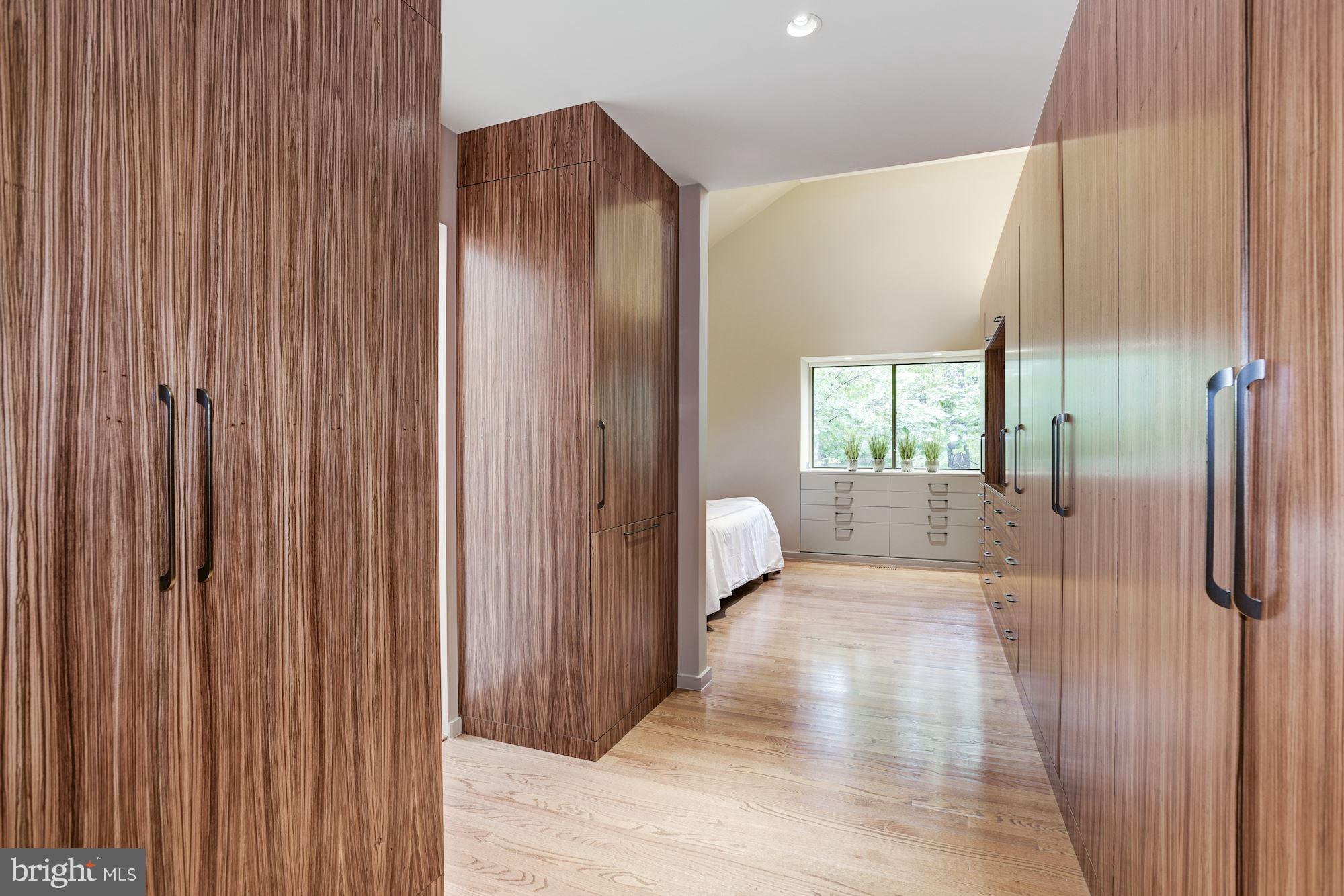 2119 Owls Cove Lane Reston, VA 20191 - Photo 12 of 30 a walk in closet with wooden floor