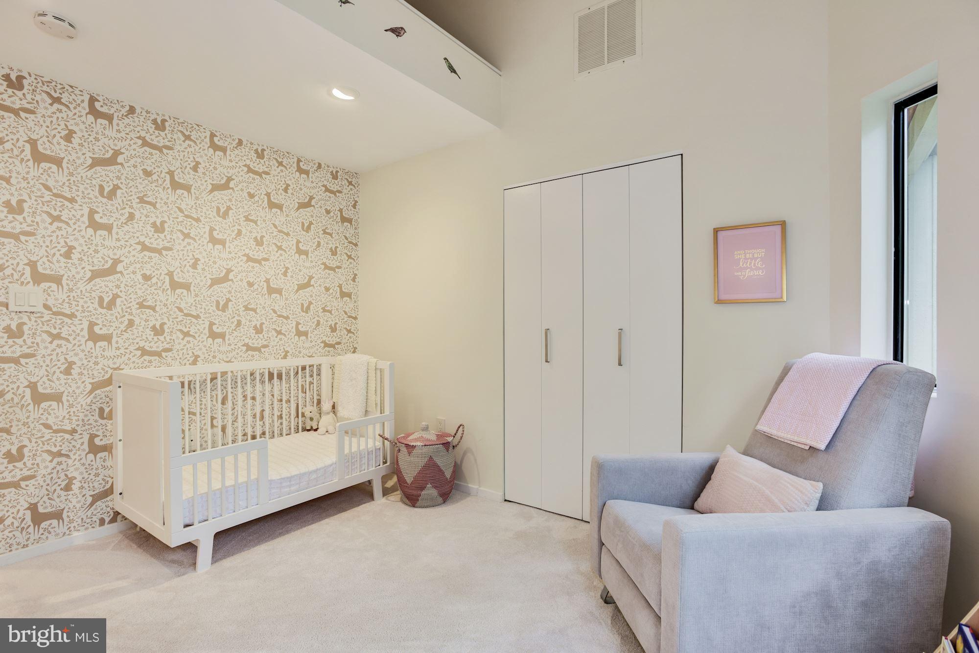 2119 Owls Cove Lane Reston, VA 20191 - Photo 20 of 30 a bedroom with a couch and a couch