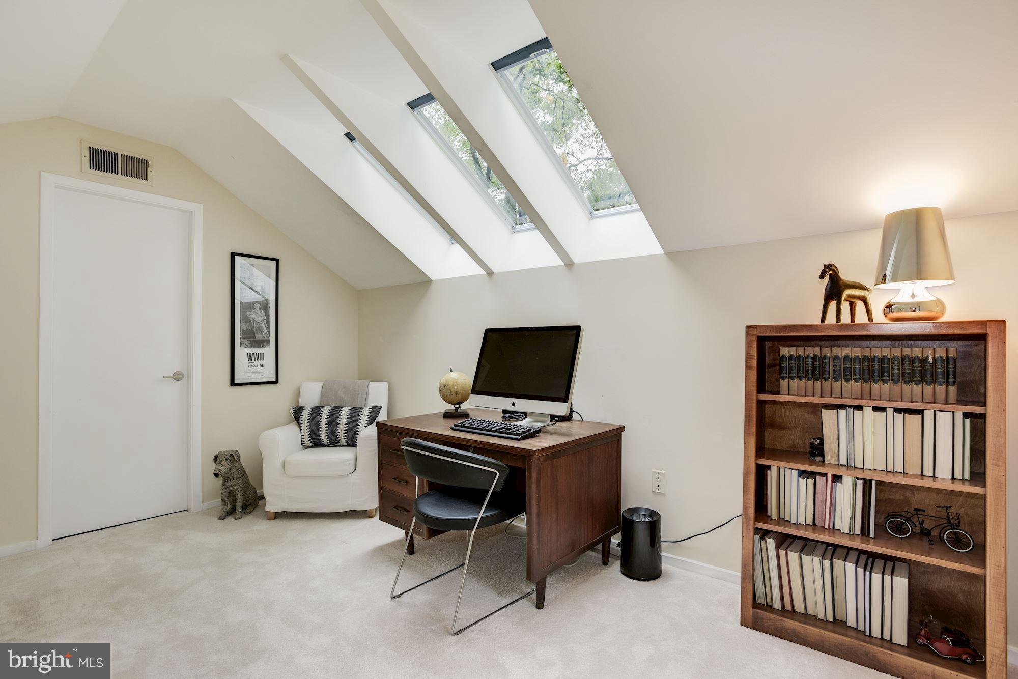 2119 Owls Cove Lane Reston, VA 20191 - Photo 23 of 30 a bedroom with furniture and a book shelf