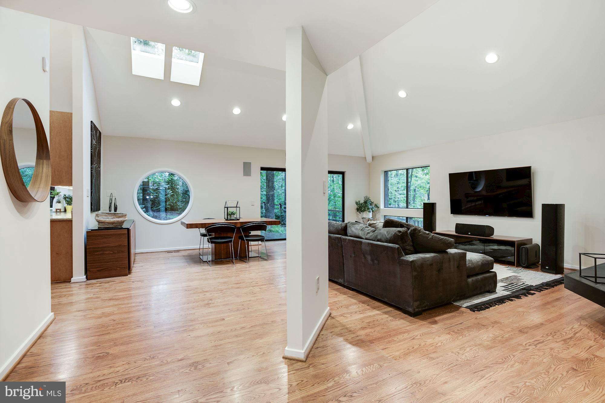 2119 Owls Cove Lane Reston, VA 20191 - Photo 30 of 30 a living room with furniture and a flat screen tv