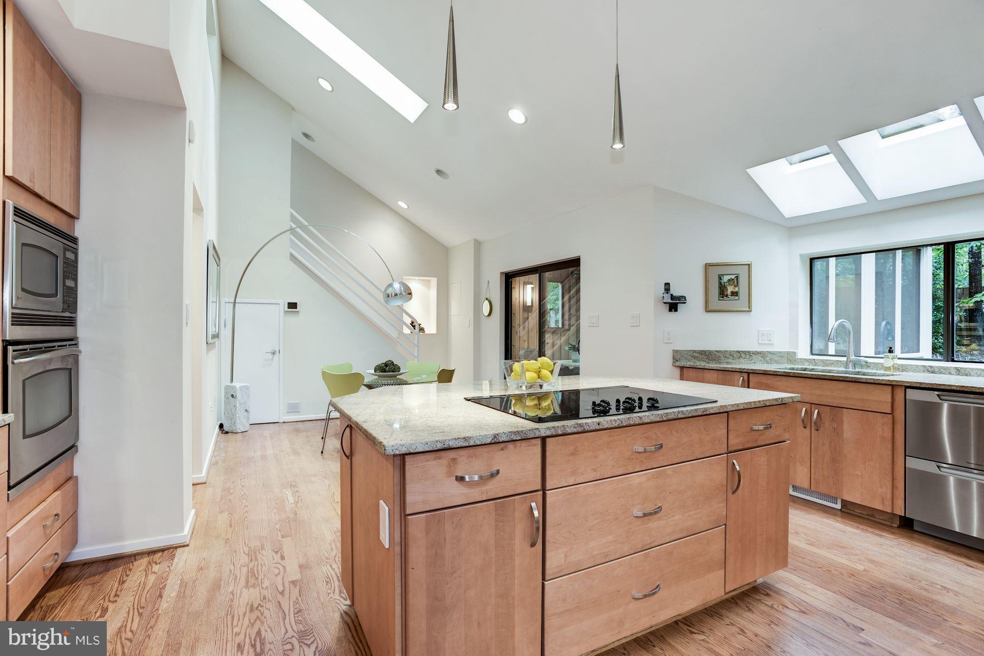 2119 Owls Cove Lane Reston, VA 20191 - Photo 8 of 30 a kitchen with sink stove and cabinets