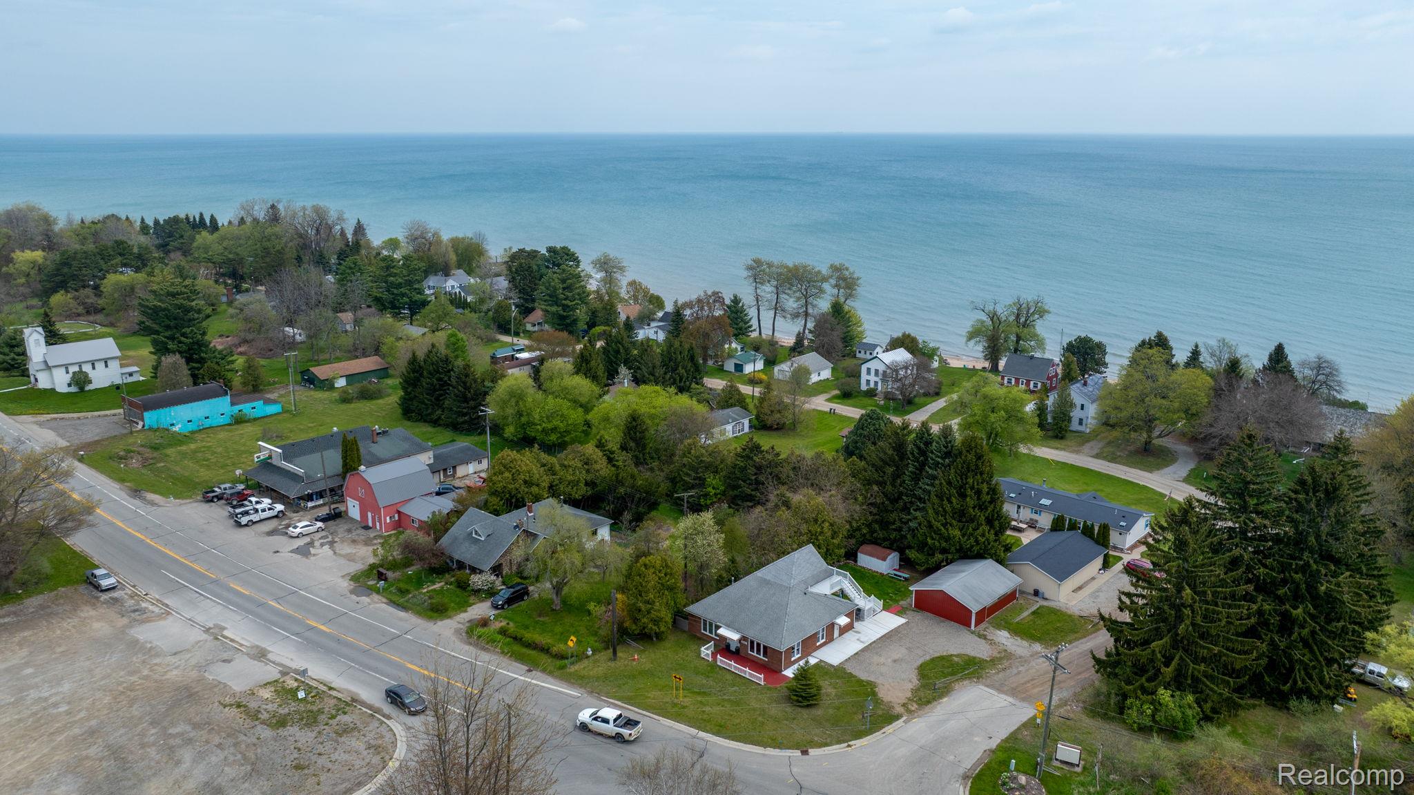 2400 North Lakeshore Road Carsonville, MI 48419 - Photo 30 of 33 Aerial view of residential area with a nearby body of water