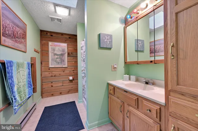 a bedroom with a bed next to a window with the outer view