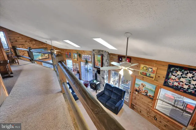 a view of a chairs and table in a room