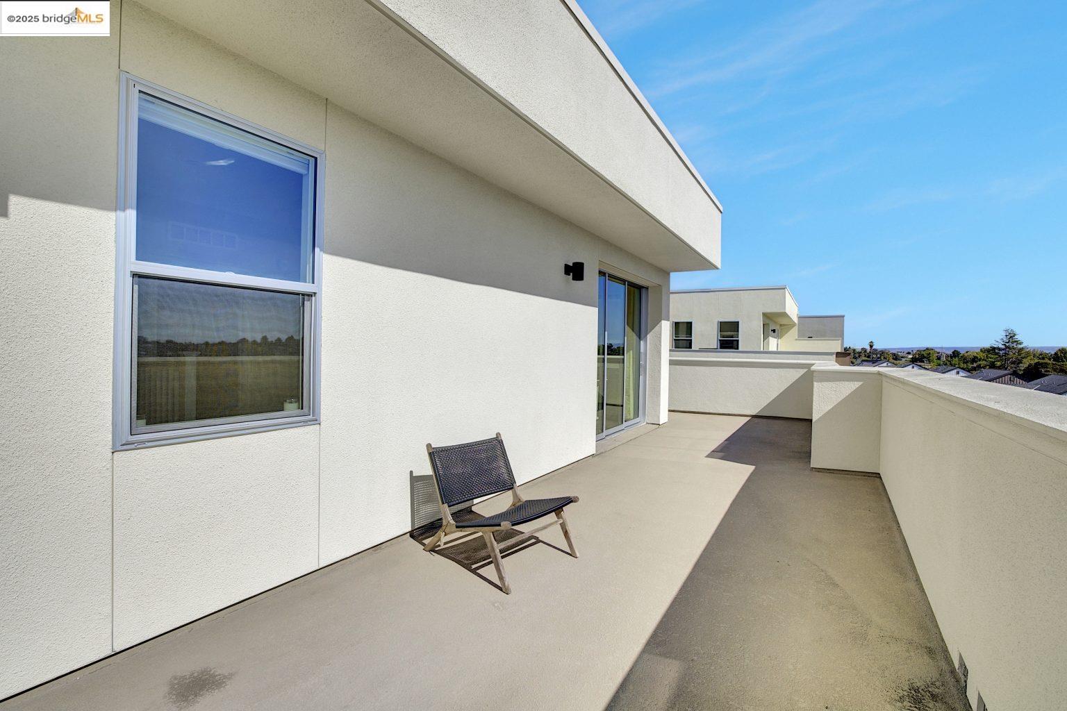 210 Waters Park Circle, Unit 304 San Mateo, CA 94403 - Photo 11 of 17 a view of a kitchen with a sink