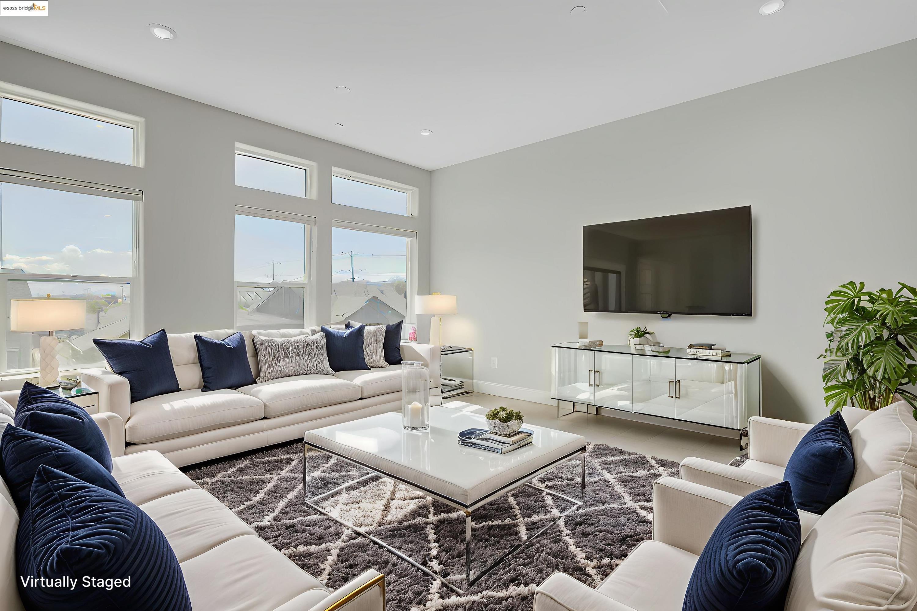 210 Waters Park Circle, Unit 304 San Mateo, CA 94403 - Photo 4 of 17 a living room with furniture and a flat screen tv