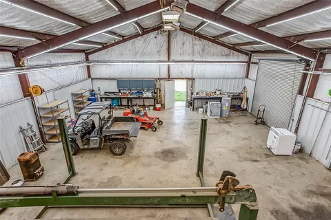 a aerial view of a house with a ocean view