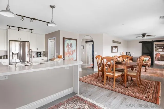a view of a dining room with furniture