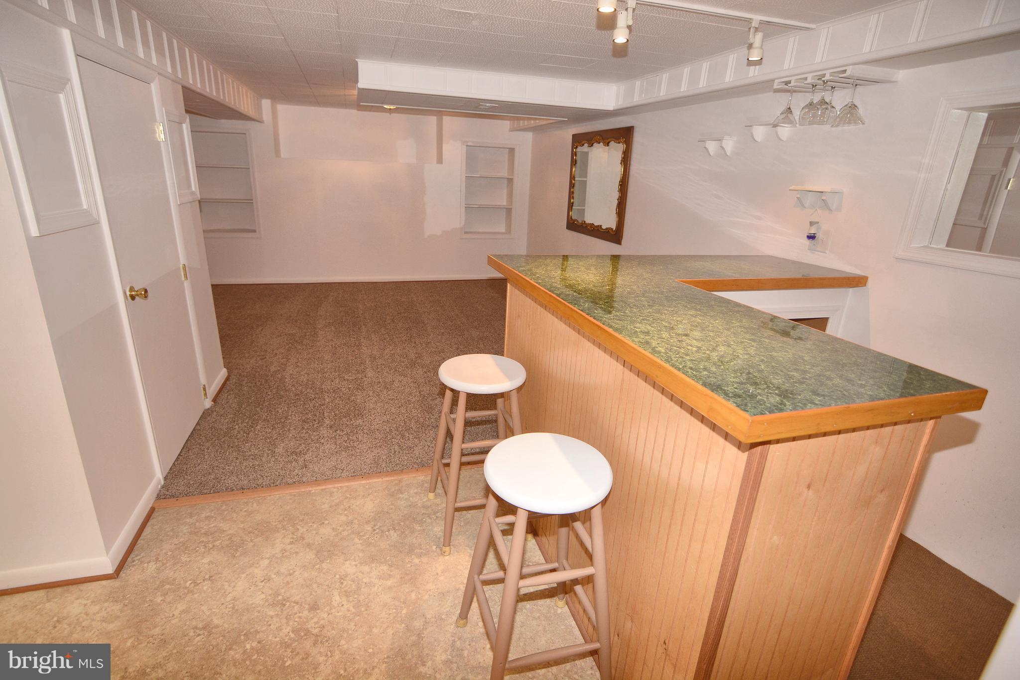 400 Ridgely Road Glen Burnie, MD 21061 - Photo 11 of 27 Lower level family room with bar!