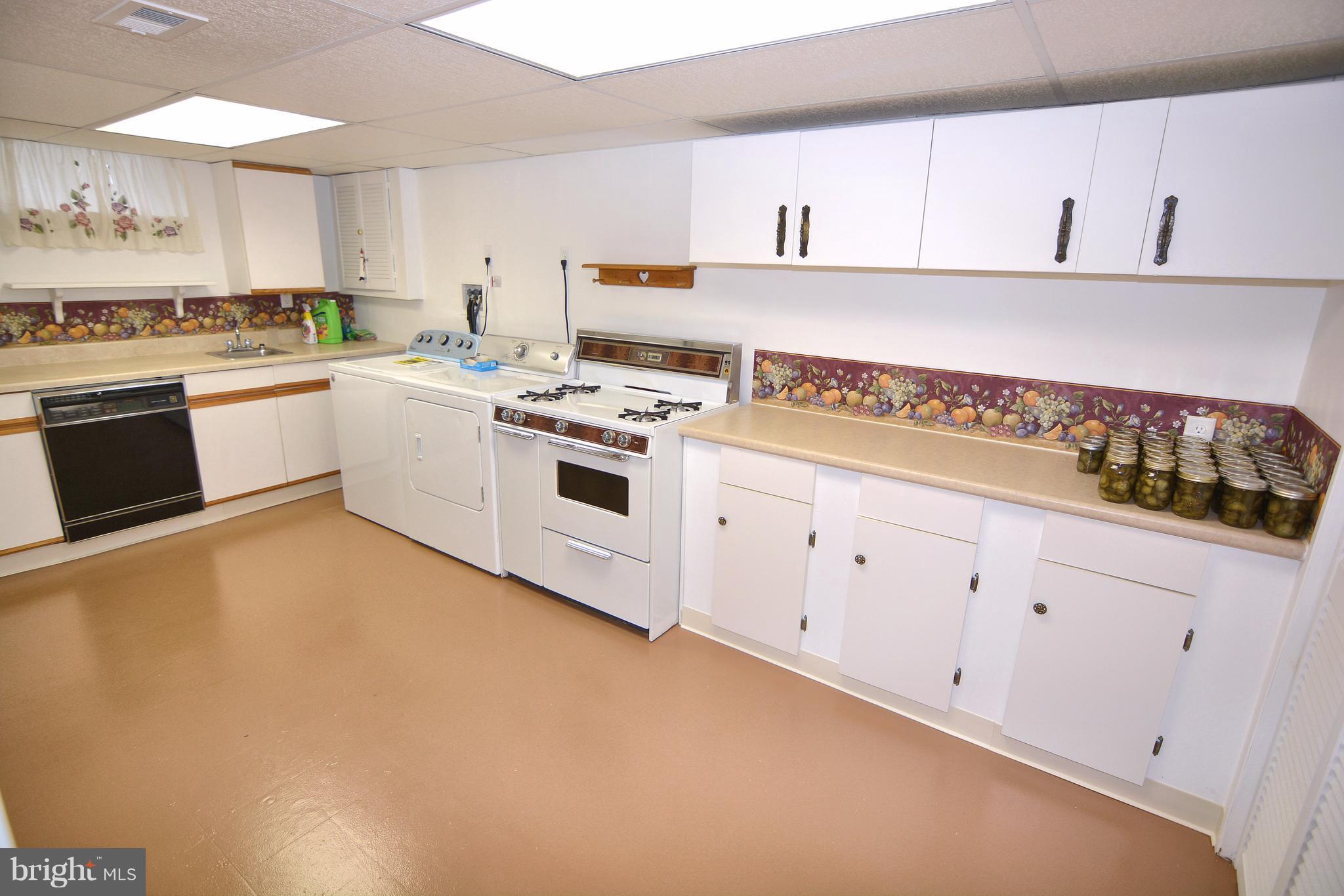 400 Ridgely Road Glen Burnie, MD 21061 - Photo 15 of 27 Lower level kitchen with laundry.