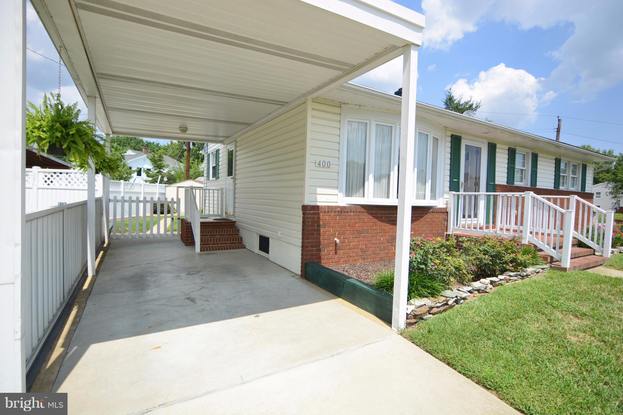 400 Ridgely Road Glen Burnie, MD 21061 - Photo 25 of 27 Convenient covered carport with entrance to home.