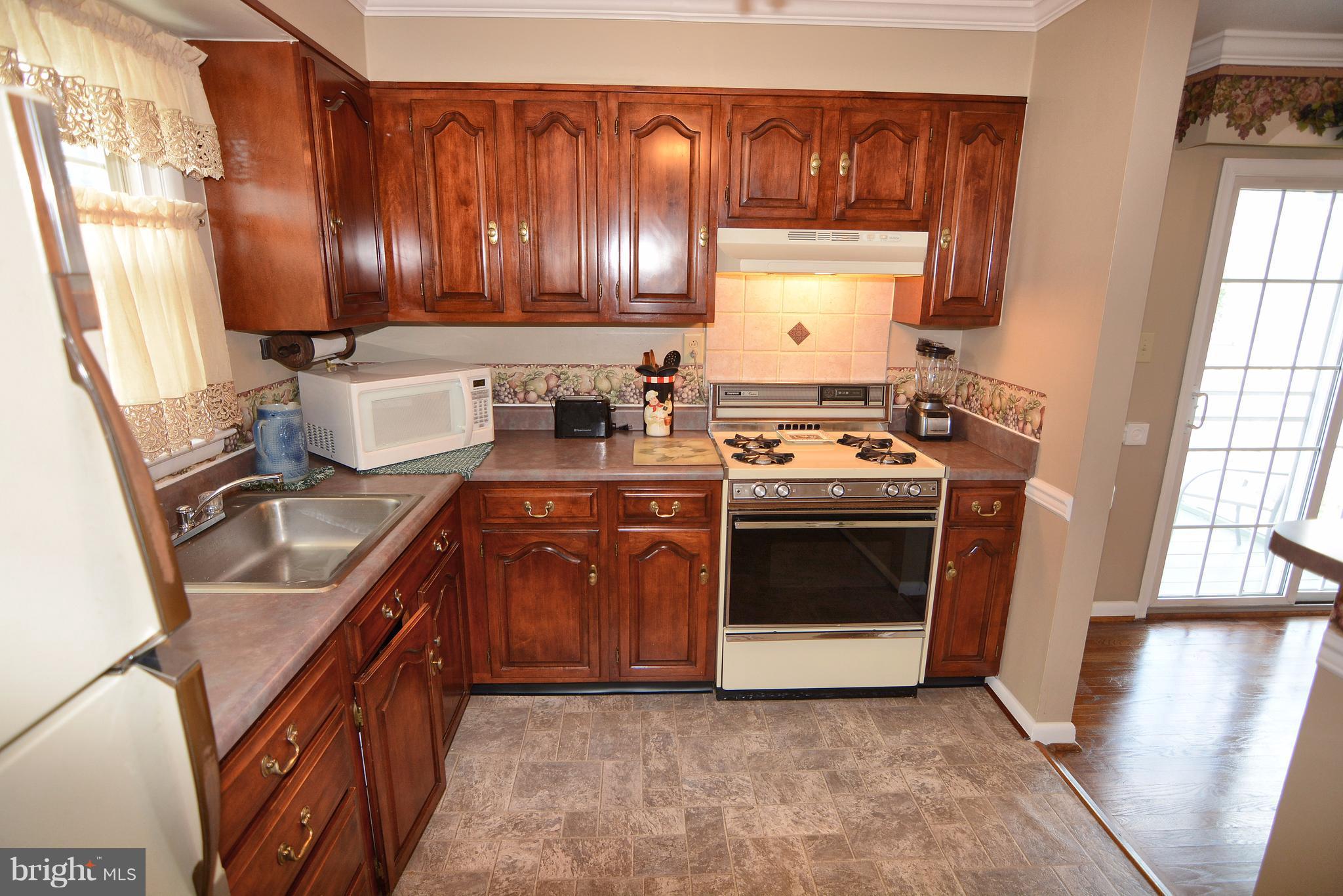 Alternate view of kitchen.