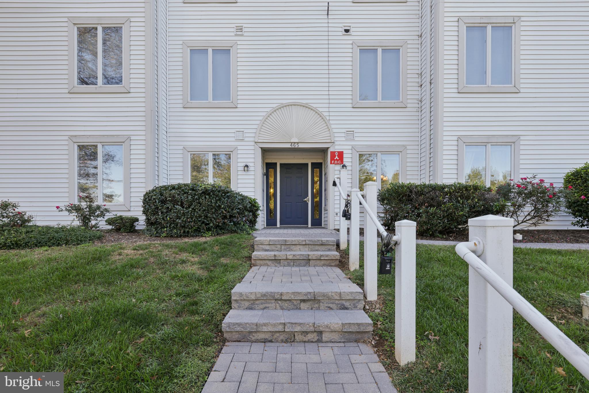 465 Pleasanton Road, Unit C14 Westminster, MD 21157 - Photo 2 of 39 a front view of a house with garden