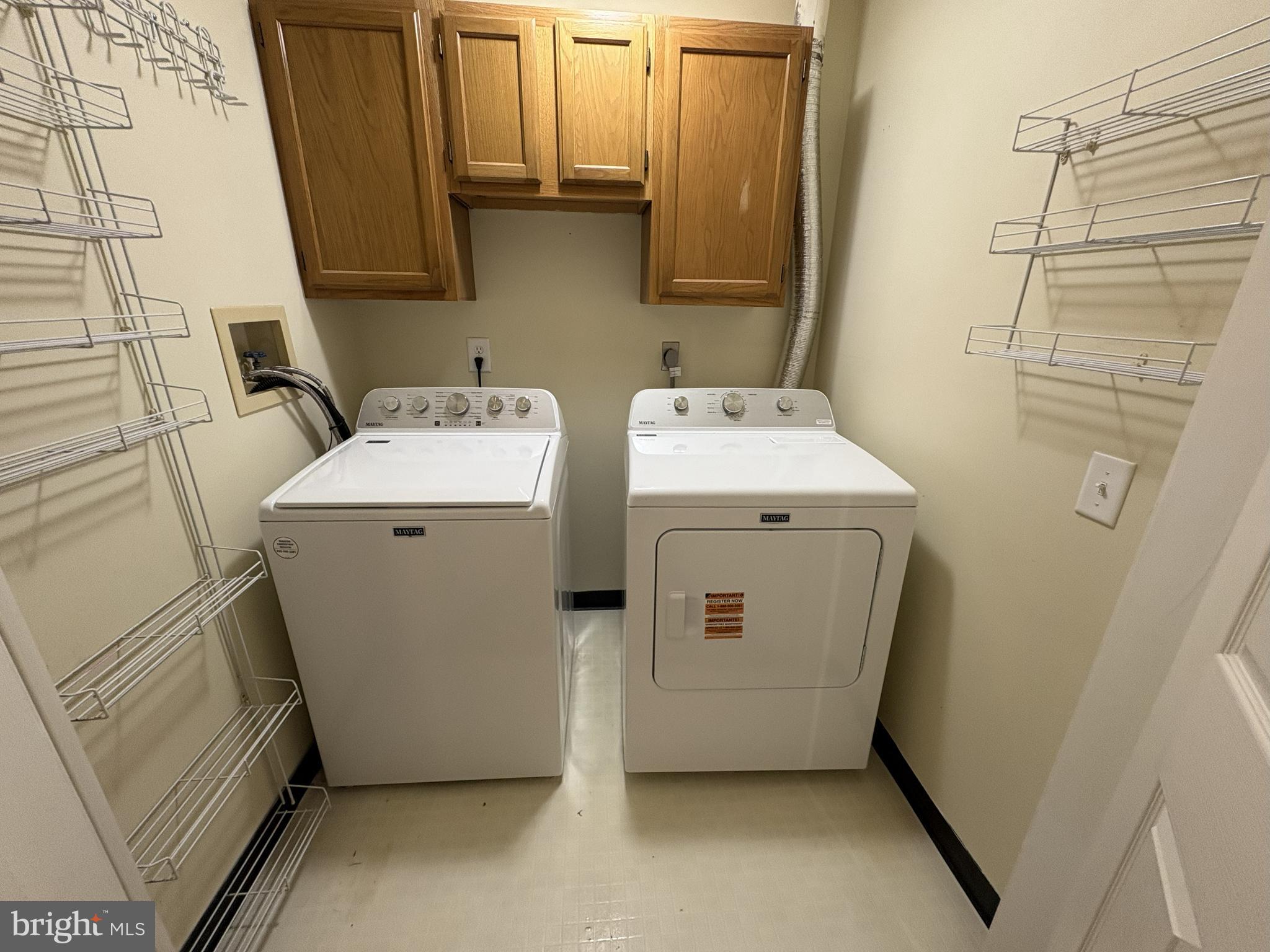 465 Pleasanton Road, Unit C14 Westminster, MD 21157 - Photo 22 of 39 a utility room with dryer and washer