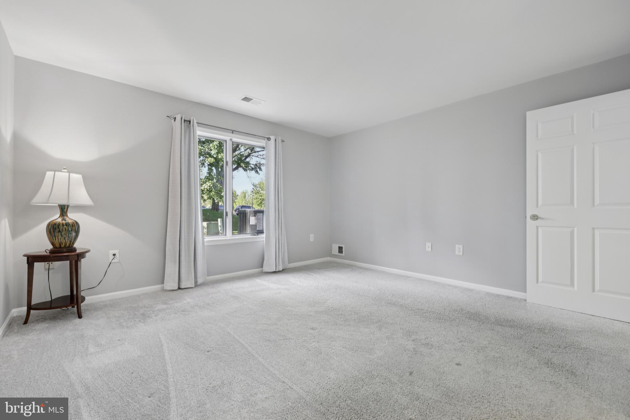 465 Pleasanton Road, Unit C14 Westminster, MD 21157 - Photo 23 of 39 a view of an empty room with a window