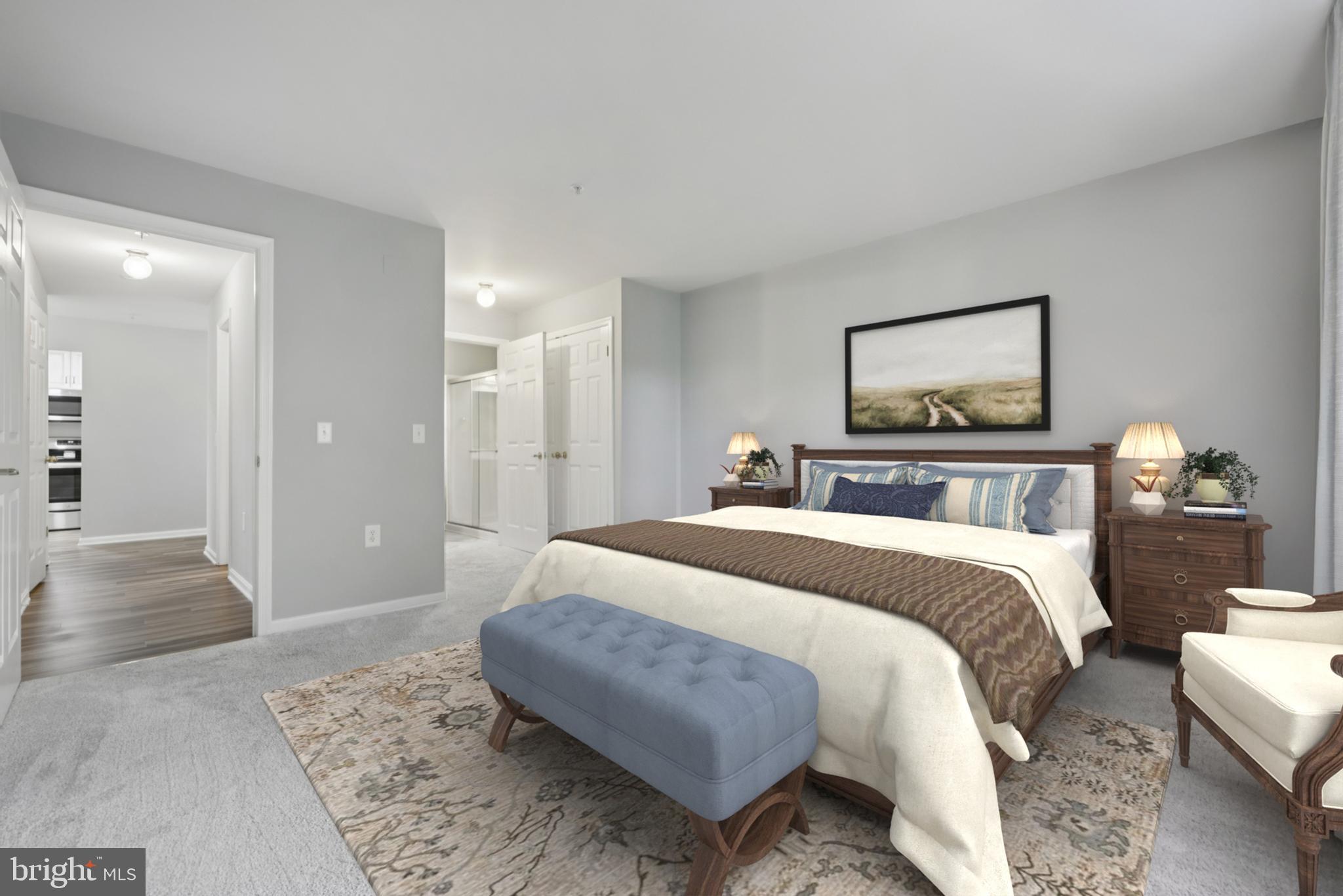 465 Pleasanton Road, Unit C14 Westminster, MD 21157 - Photo 26 of 39 a spacious bedroom with a bed and a painting on the wall