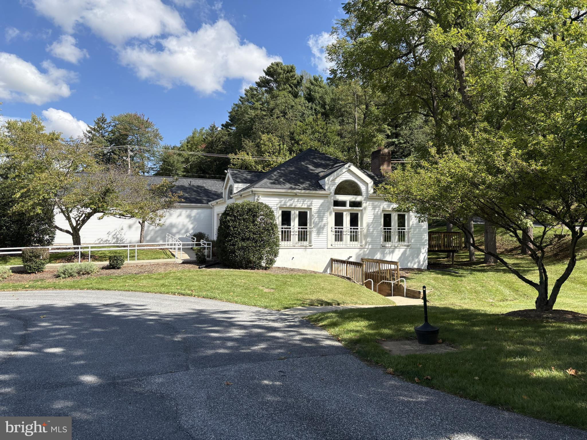 465 Pleasanton Road, Unit C14 Westminster, MD 21157 - Photo 38 of 39 a front view of a house with a yard and garage