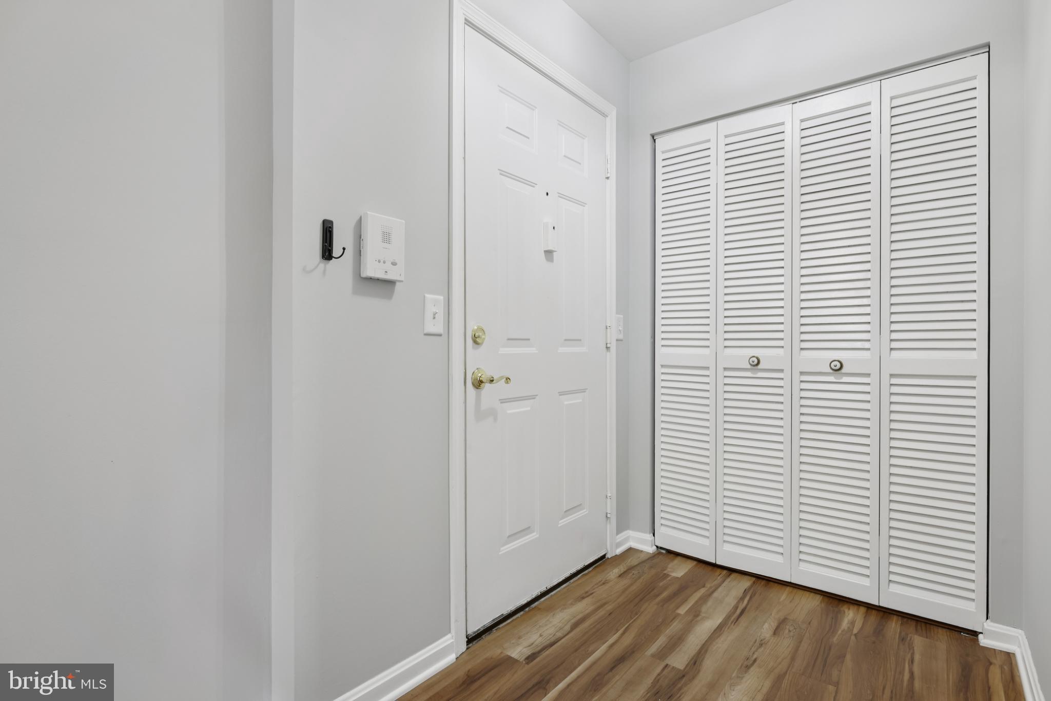 465 Pleasanton Road, Unit C14 Westminster, MD 21157 - Photo 6 of 39 a view of a room with wooden floor and a window