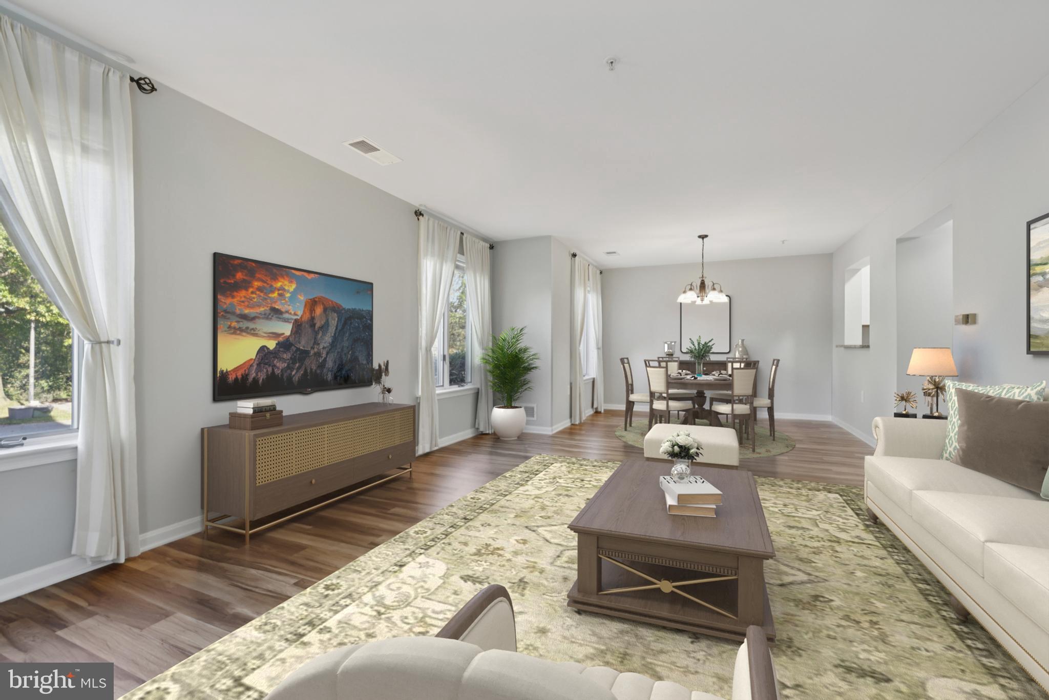 465 Pleasanton Road, Unit C14 Westminster, MD 21157 - Photo 9 of 39 a living room with furniture and a flat screen tv