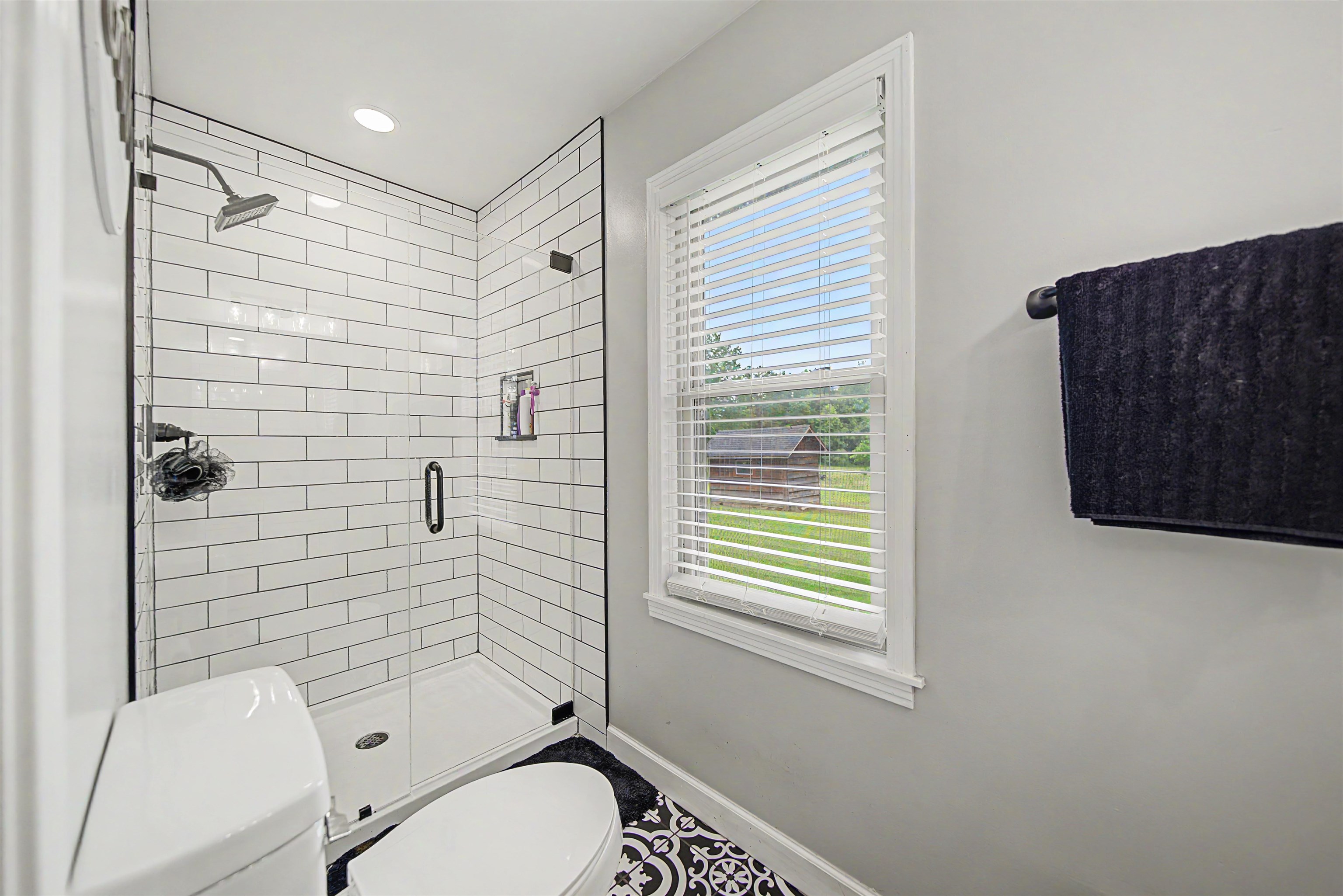 336 57th Highway West Ramer, TN 38367 - Photo 5 of 39 Walk-in shower with subway tile surround and clear glass enclosure