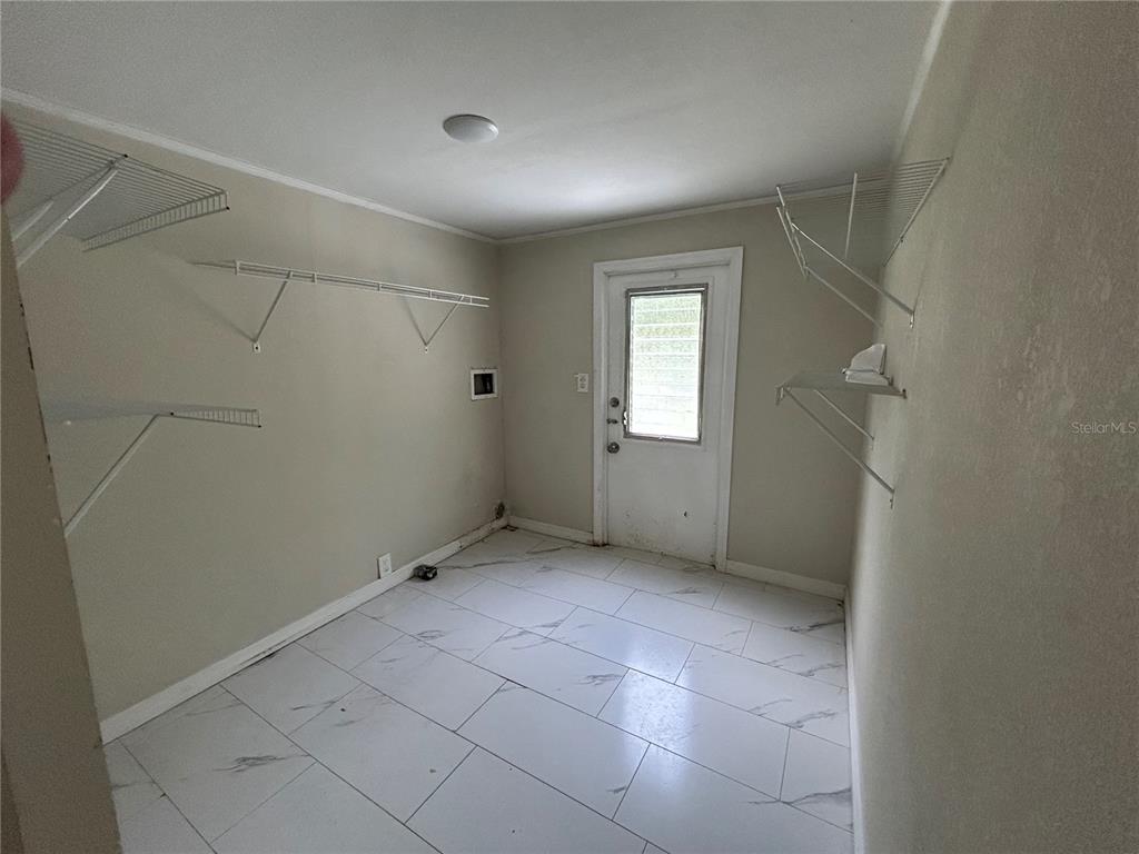 4265 North Beginning Path Crystal River, FL 34428 - Photo 10 of 18 a view of an empty room with windows