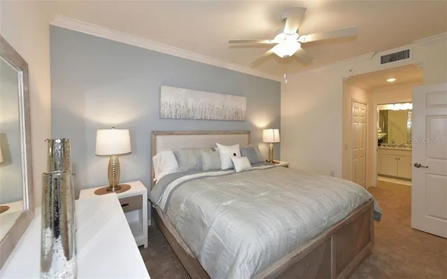 a bathroom with a granite countertop sink a mirror and a shower